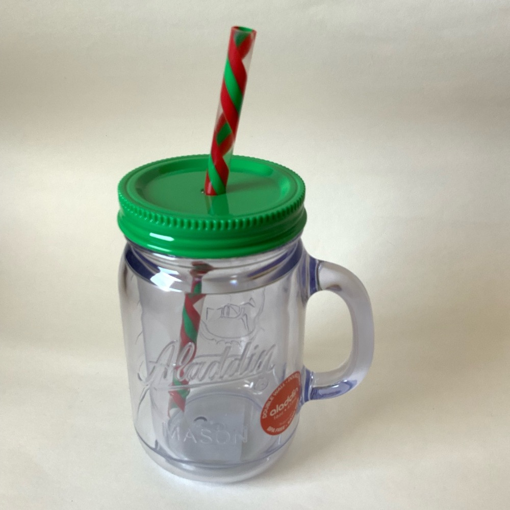 Mason Jar with Green Lid and Red Straw